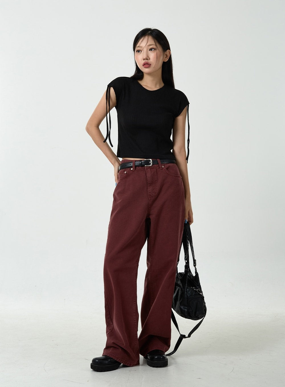 Taranta - Black studded shoulder bag