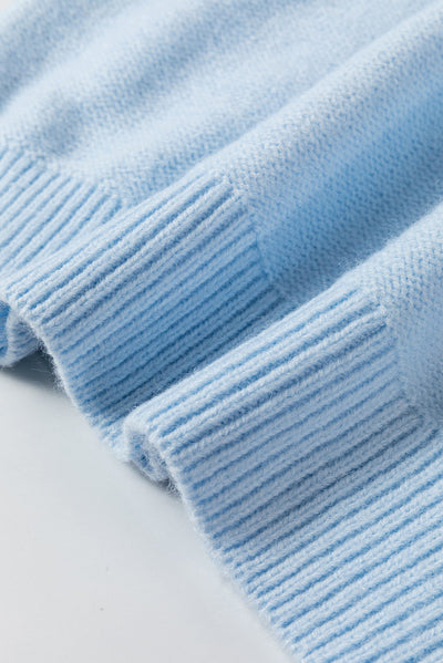 Anne - Knitted jumper with floral pattern and ribbed edges