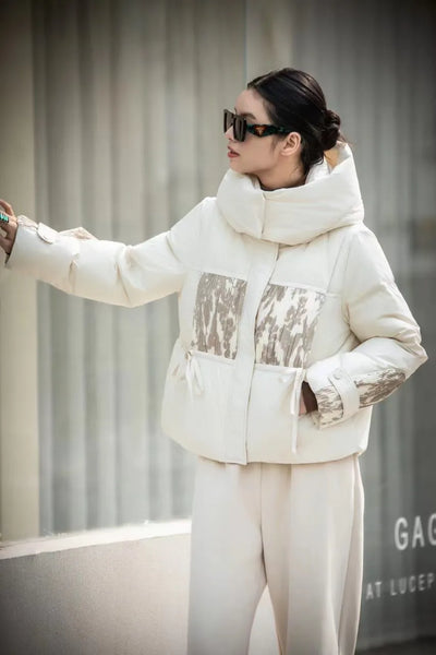 Elvy - Short down jacket with hood and soft seams