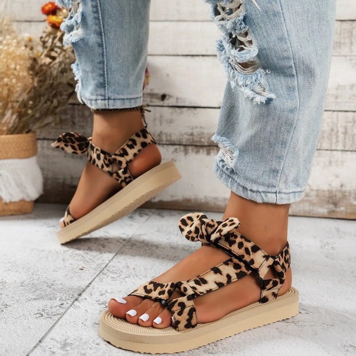 Women's flat sandals with leopard print bow - Narella