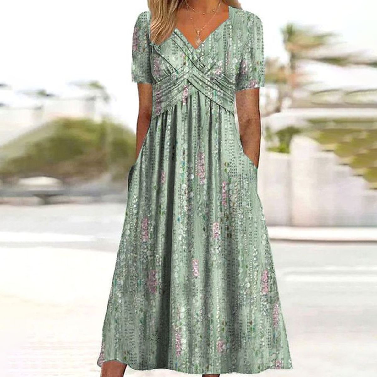 Green midi dress with V-neck and short sleeves
