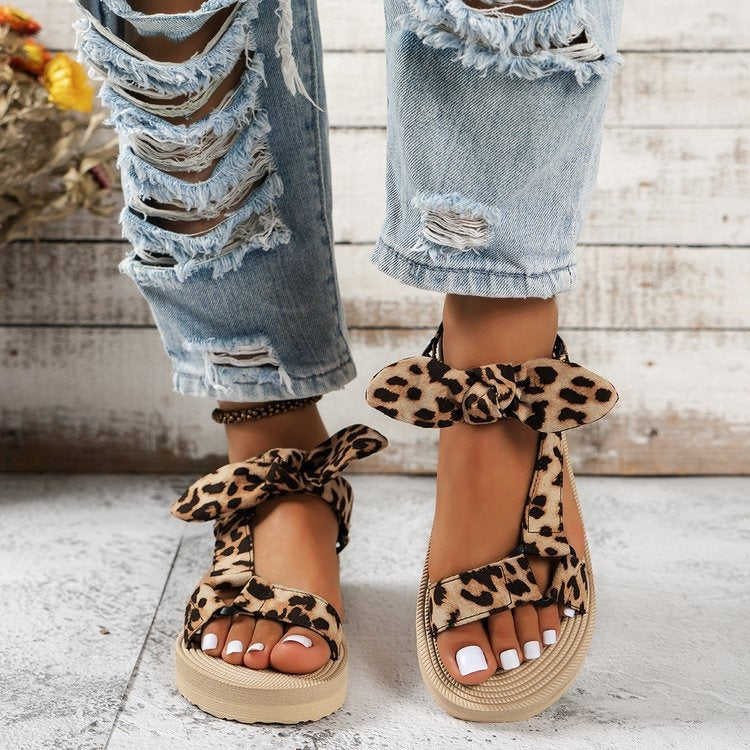 Women's flat sandals with leopard print bow - Narella