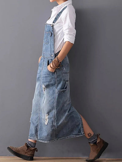 Bib dress in distressed denim with slit at the back - Lara