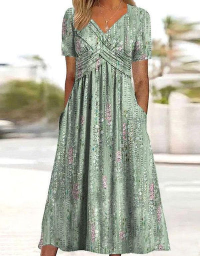 Green midi dress with V-neck and short sleeves