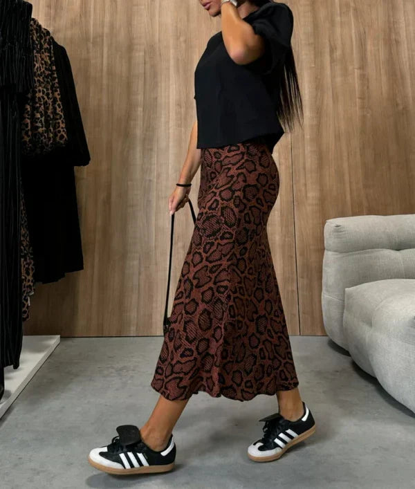 High-waisted slimming skirt with a bold and chic animal print perfect for a bold and fashionable look