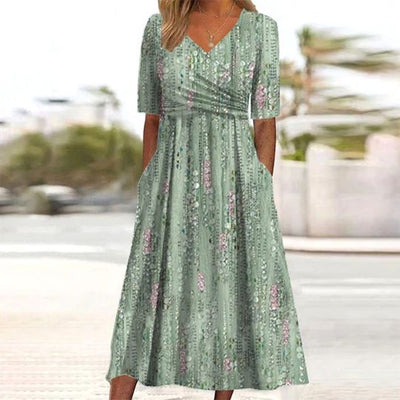 Gina - Green midi dress with plant print on the side