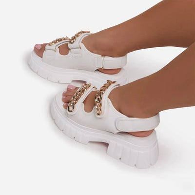 Casandra - Fashionable platform sandals with metal cufflinks