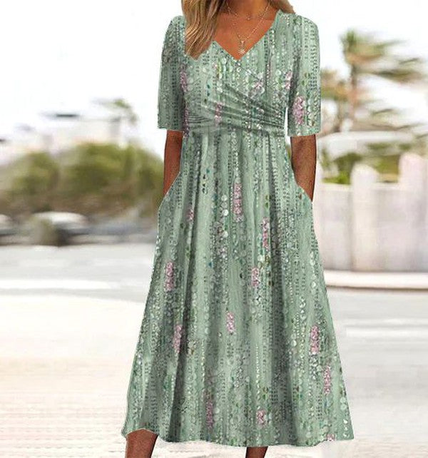 Gina - Green midi dress with plant print on the side