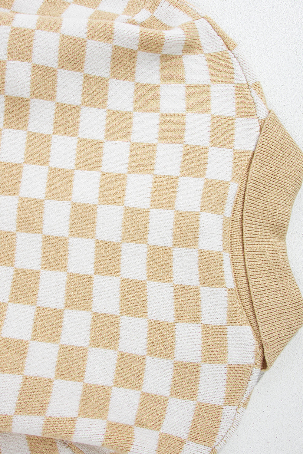 Aude - Checked V-neck jumper with buttons and dropped shoulders