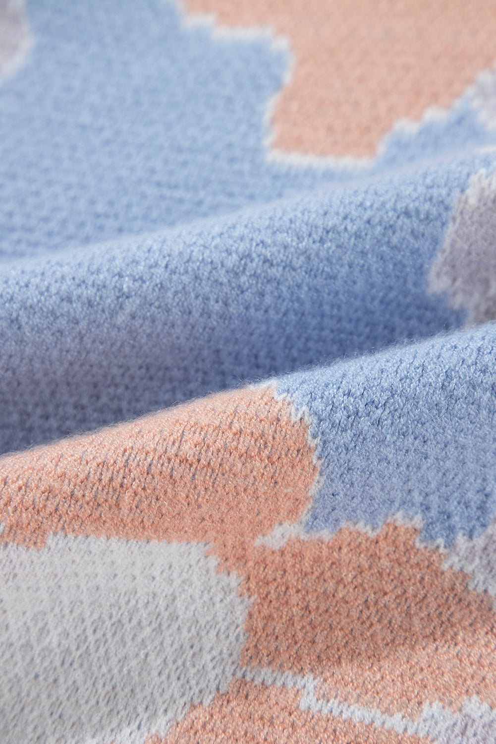 Blanche - Blue knitted jumper with a round neckline and floral pattern with dropped shoulders