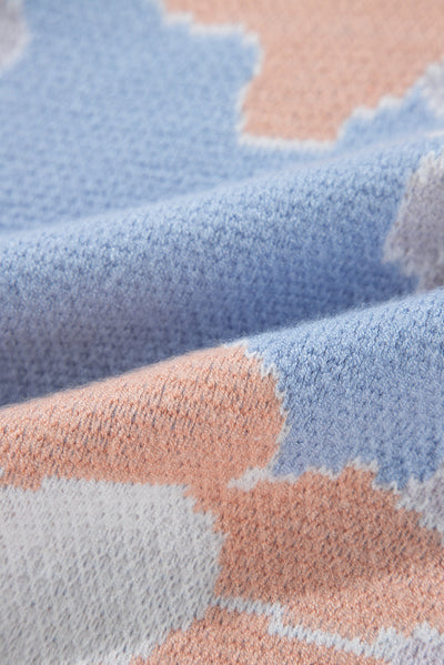 Blanche - Blue knitted jumper with a round neckline and floral pattern with dropped shoulders