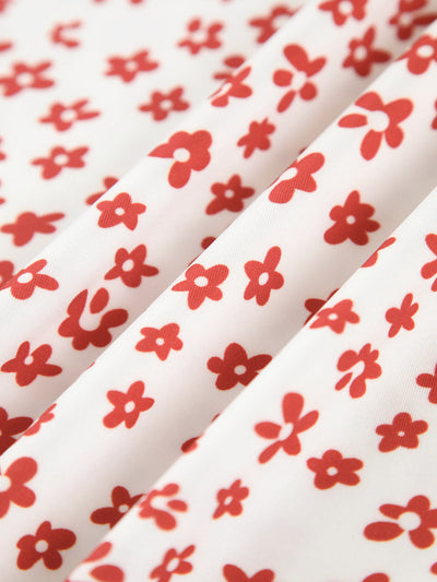 Emma - Long strappy dress with floral print, crossover and flowing