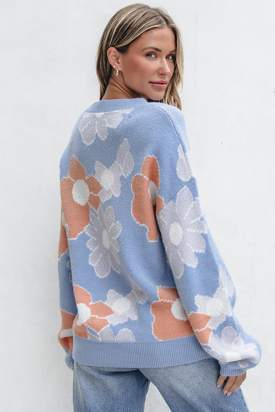 Blanche - Blue knitted jumper with a round neckline and floral pattern with dropped shoulders
