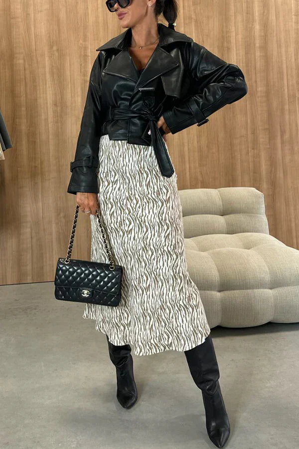 High-waisted slimming skirt with a bold and chic animal print perfect for a bold and fashionable look