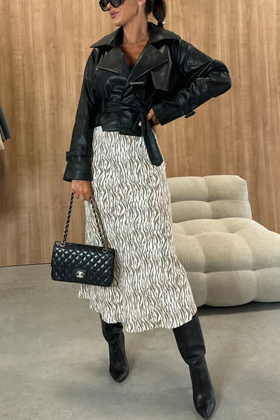 High-waisted slimming skirt with a bold and chic animal print perfect for a bold and fashionable look