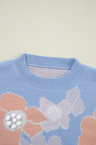 Blanche - Blue knitted jumper with a round neckline and floral pattern with dropped shoulders