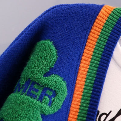 Women's chunky knit cardigan with floral appliqués fun style - Ingrid