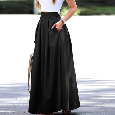 Elegant and fluid high-waist pleated skirt, ideal for a sophisticated and feminine look