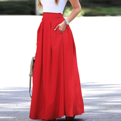 Elegant and fluid high-waist pleated skirt, ideal for a sophisticated and feminine look